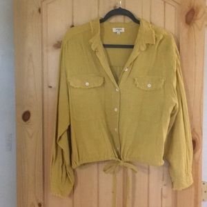 Yellow button down blouse